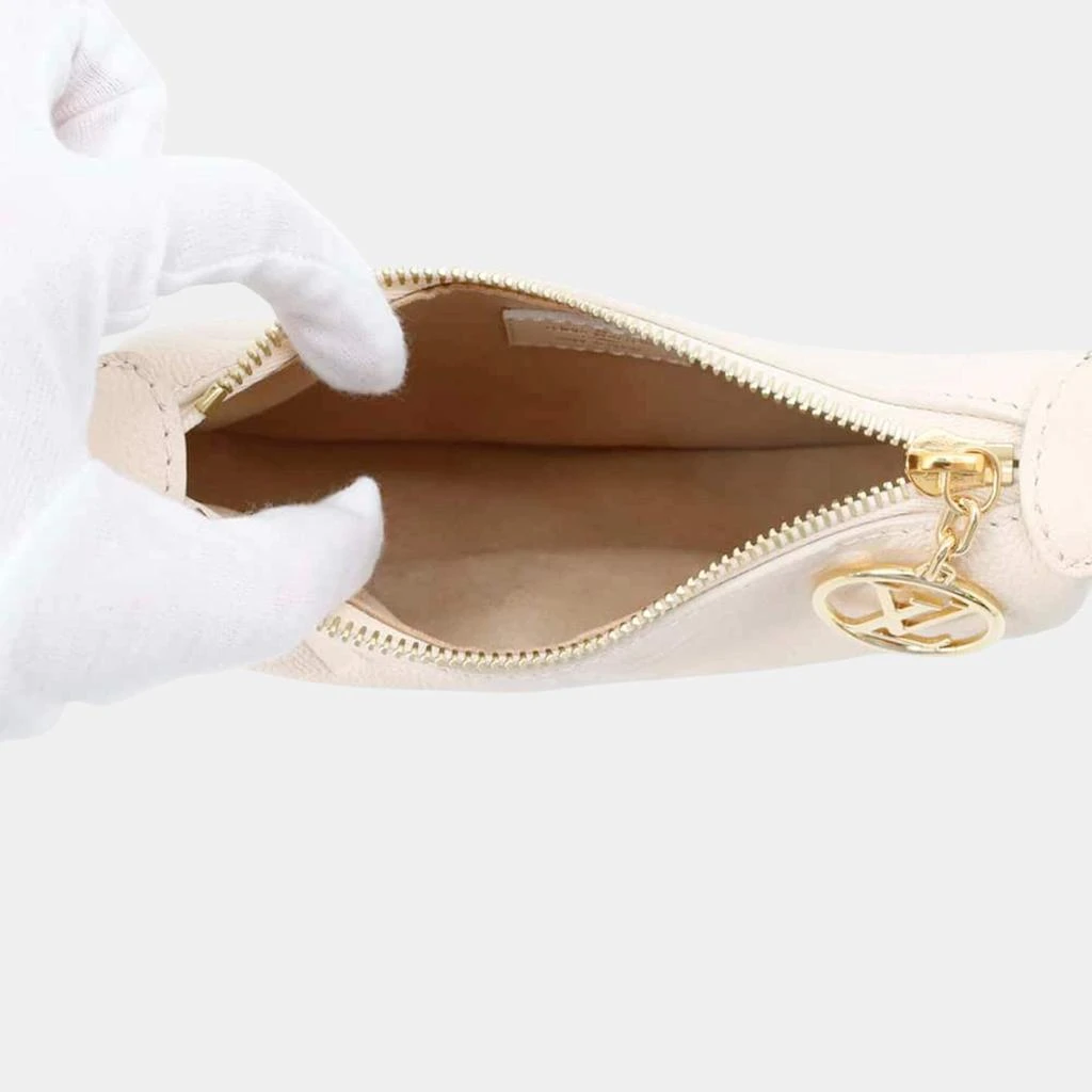Louis Vuitton Louis Vuitton mini moon claim Monogram Empreinte Leather 4