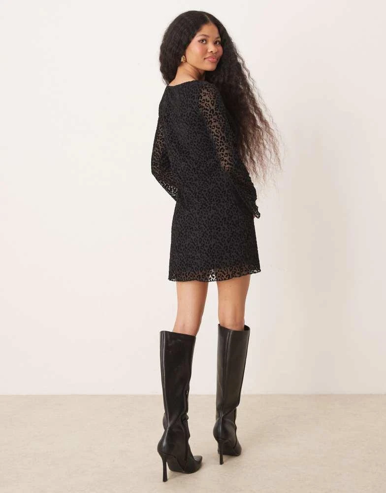New Look Petite New Look Petite flocked leopard mesh long sleeve mini dress in black 4