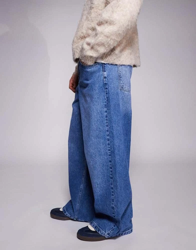 ASOS ASOS DESIGN super baggy jeans with back print in mid wash blue 2