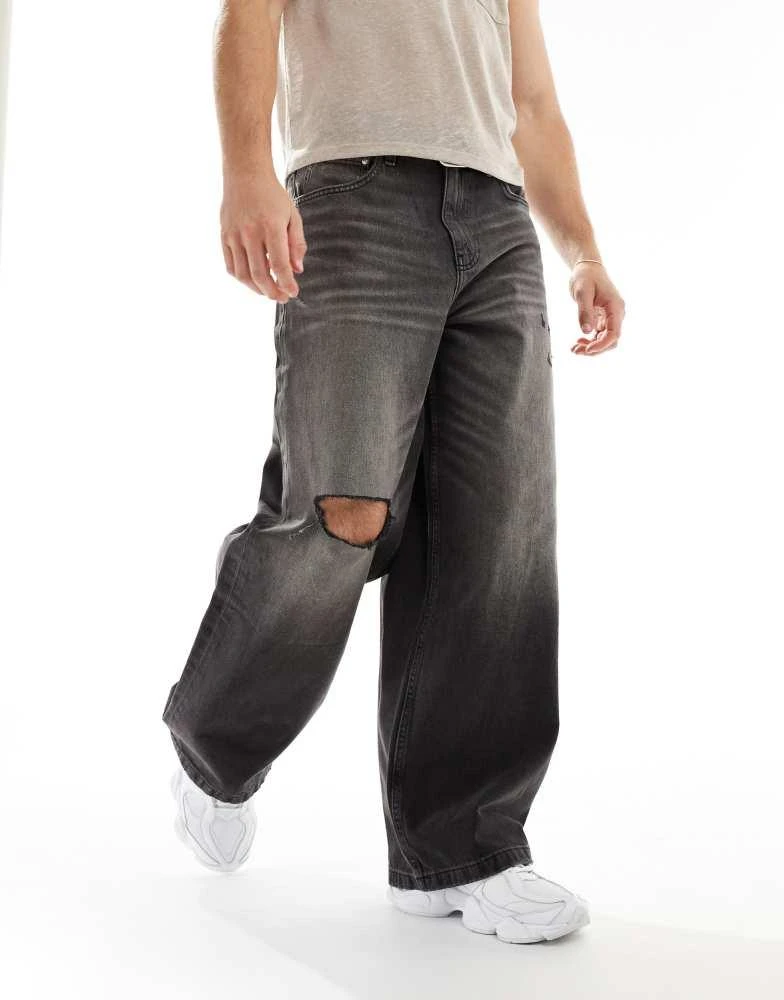 ASOS ASOS DESIGN baggy jeans with abrasions in washed black 1