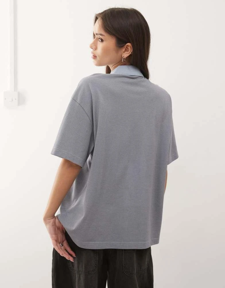 Monki Monki boxy fit short sleeve polo shirt in blue stripe 4