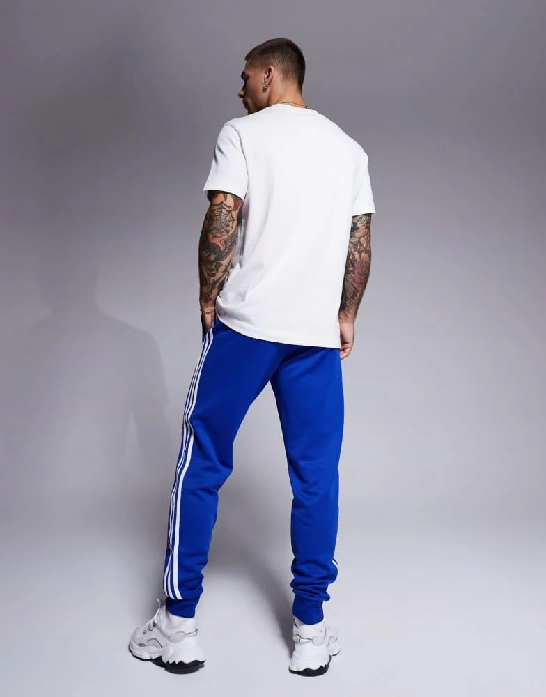 Adidas adidas Originals skinny jogger in blue 2