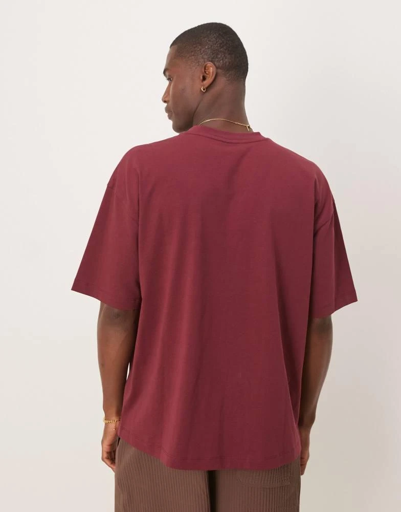 ASOS ASOS DESIGN oversized t-shirt with chest print in burgundy 4