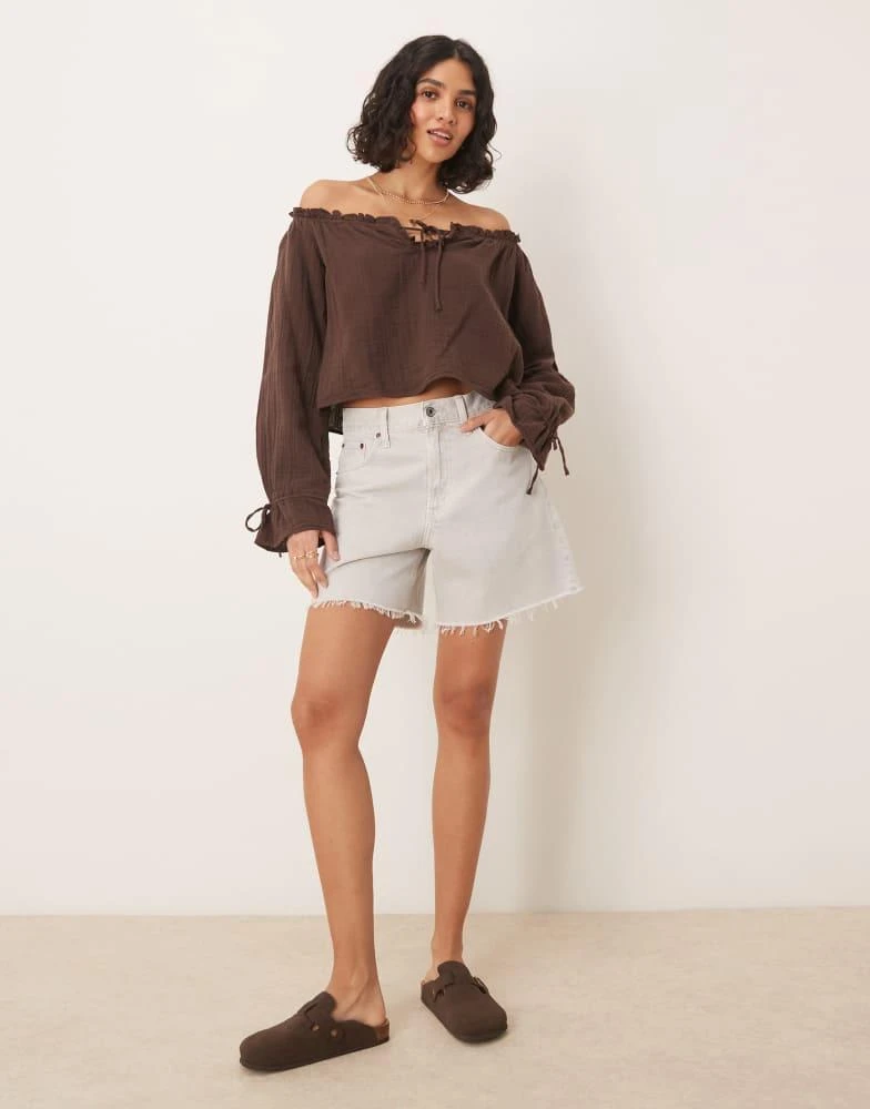 Abercrombie & Fitch Abercrombie & Fitch classic high rise loose shorts with frayed hem in washed off white 1