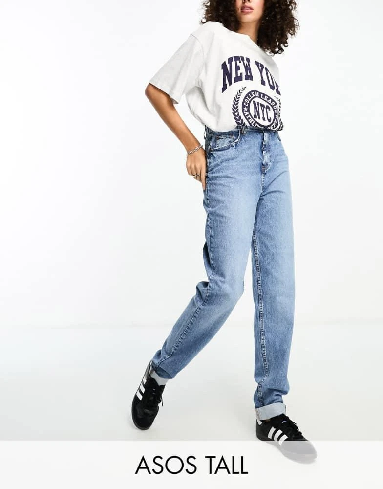 ASOS ASOS DESIGN Tall high rise relaxed mom jeans in mid blue 1
