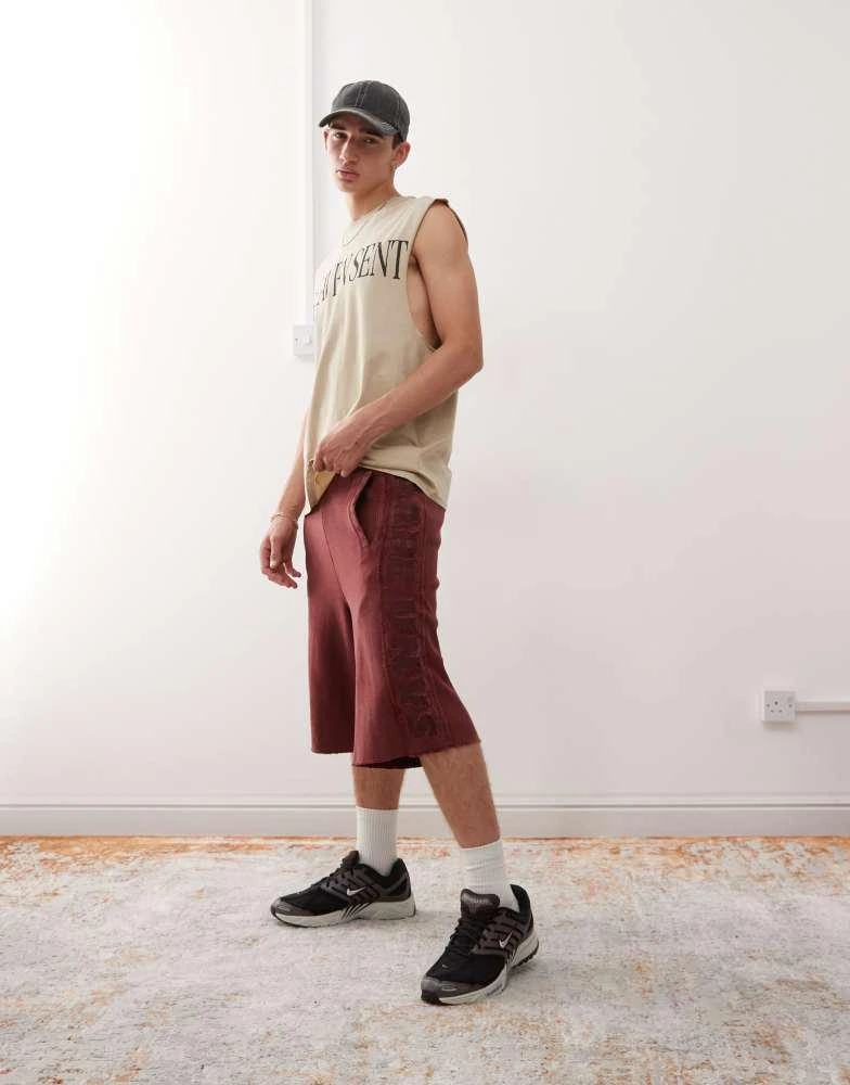 AAPE Aape by A Bathing Ape loose fit heavyweight knitted shorts in dark burgundy with embroidered side stripe 1