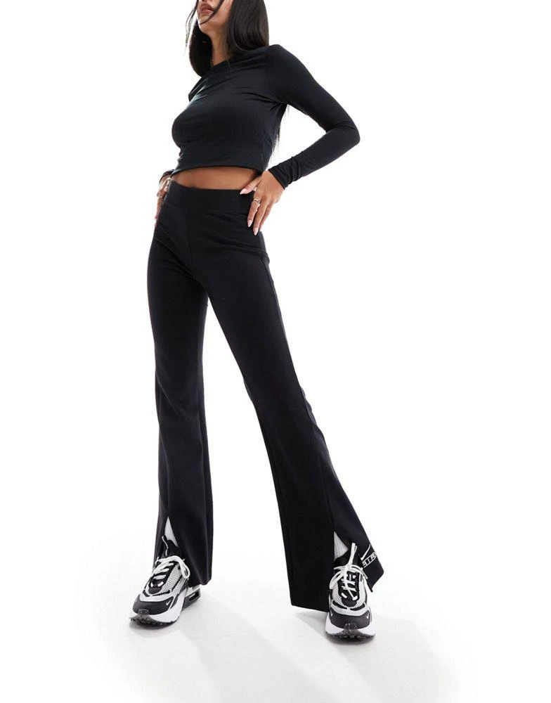 NIKE Nike Air high waisted flared leggings in black 1