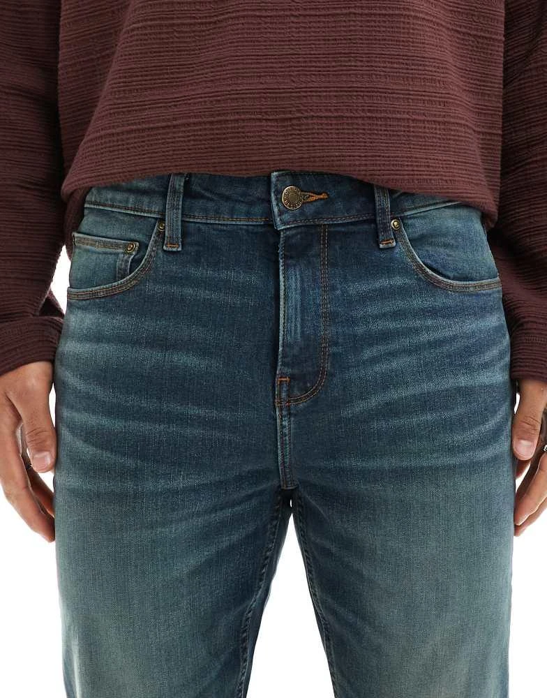 ASOS ASOS DESIGN stretch flare jeans in mid blue with green tint 5
