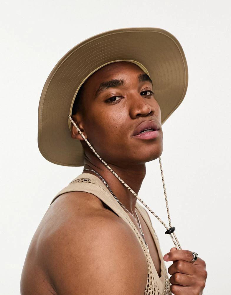 ASOS ASOS DESIGN safari bucket hat in stone nylon with contrast puller 1