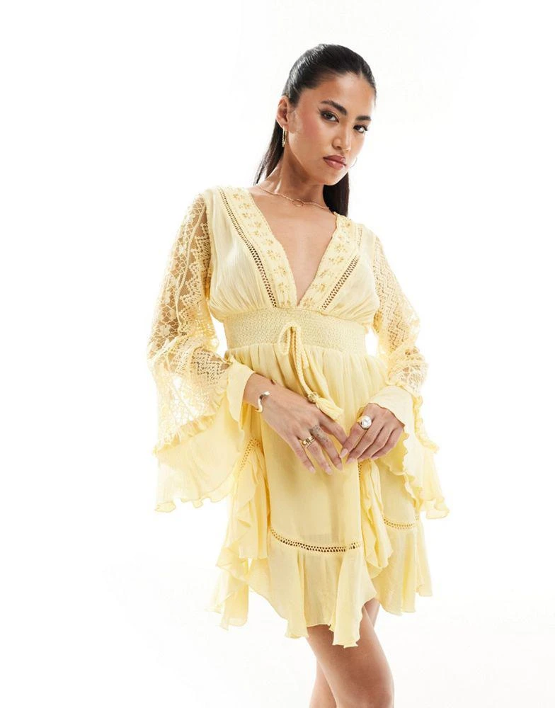 River Island River Island angel sleeve frill mini dress in light yellow 1