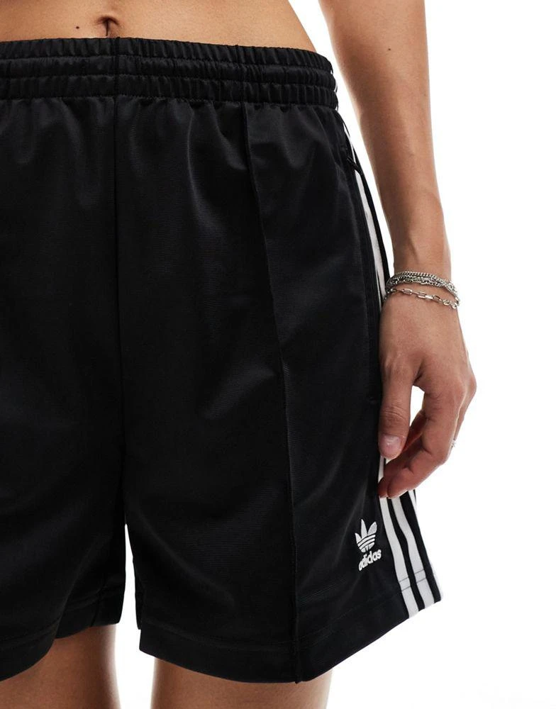 Adidas adidas Originals Firebird shorts in black 5
