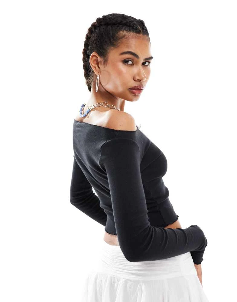 minga Minga London cutout long sleeve top with bows in black 4