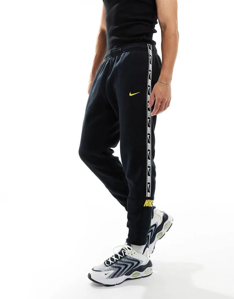 NIKE Nike Repeat logo joggers in black 1