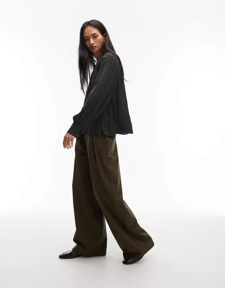 Other Stories
Other Stories chiffon volumen blouse top in black with white polka dots 2