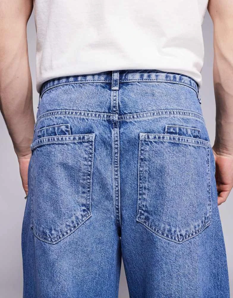 ASOS ASOS DESIGN super baggy jeans with back print in mid wash blue 4