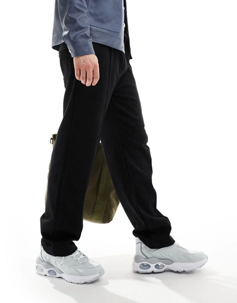 Bershka Bershka wide leg pintuck jogger in black 1