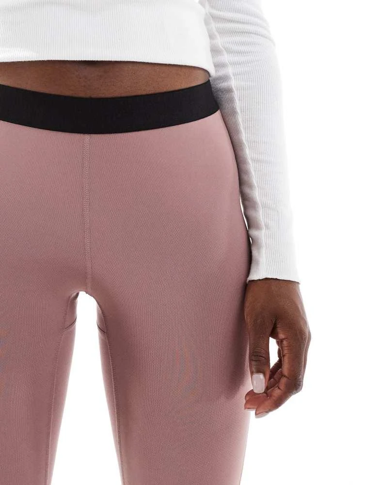 Columbia Columbia Midweight stretch ski baselayer leggings in fig pink 4