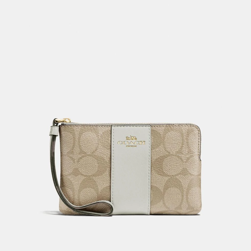 Coach Coach Outlet Corner Zip Wristlet In Signature Canvas 1