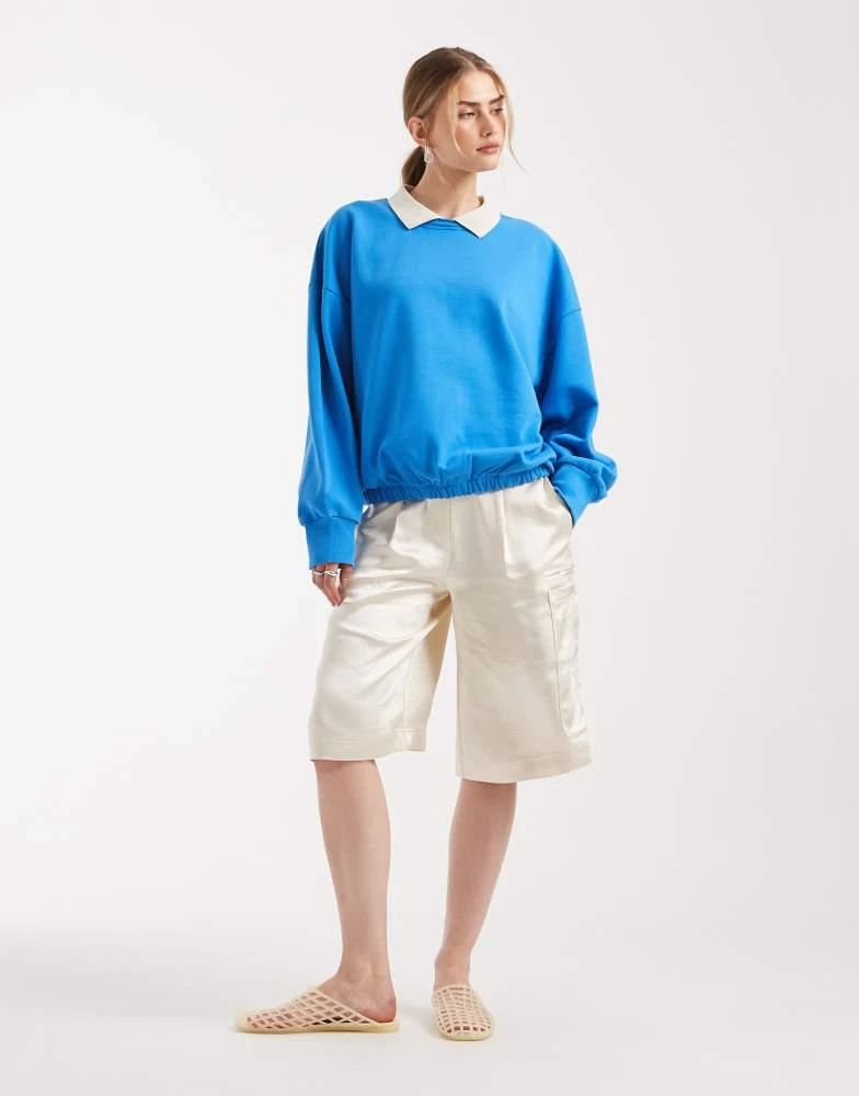 ASOS ASOS DESIGN heavy weight balloon hem sweat with polo collar in blue