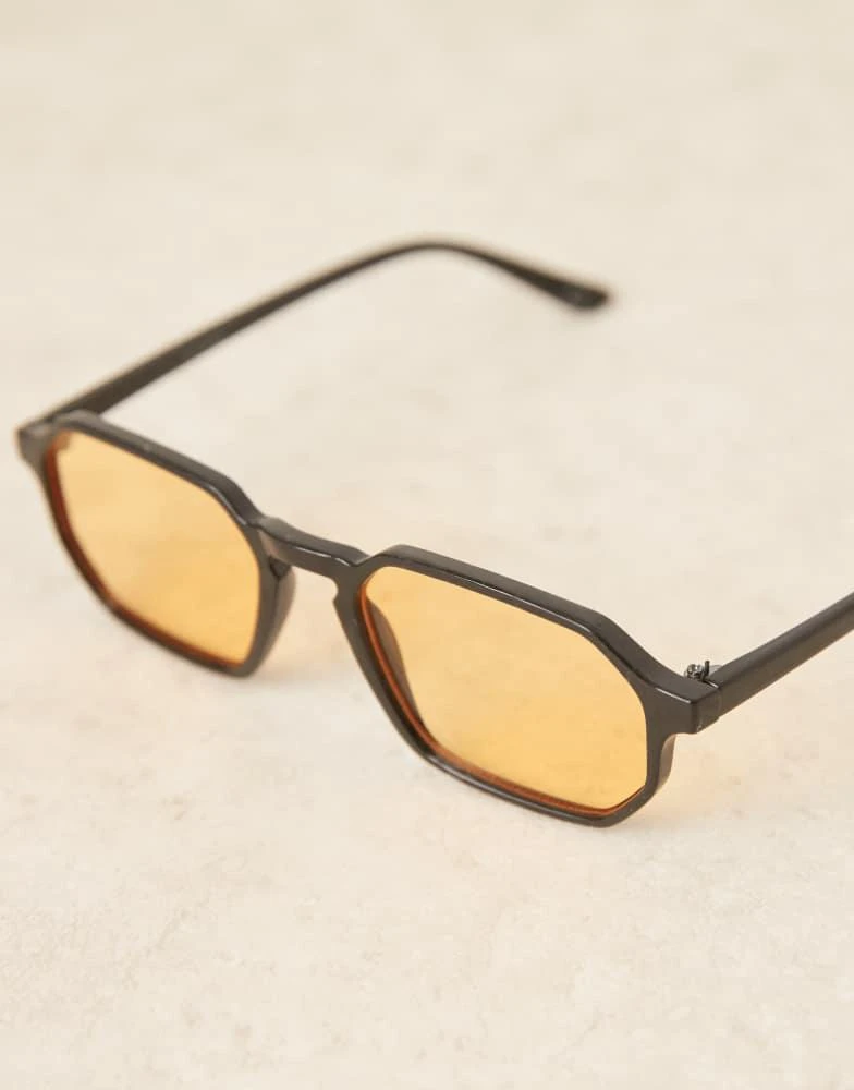 ASOS ASOS DESIGN round sunglasses with black frame and amber lens 2