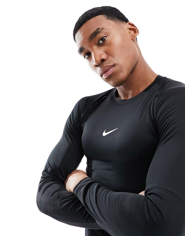 Nike Training Nike Pro Training Swoosh Dri Fit long sleeve t shirt in black Black L Chest 41 44 T Shirts BeyondStyle