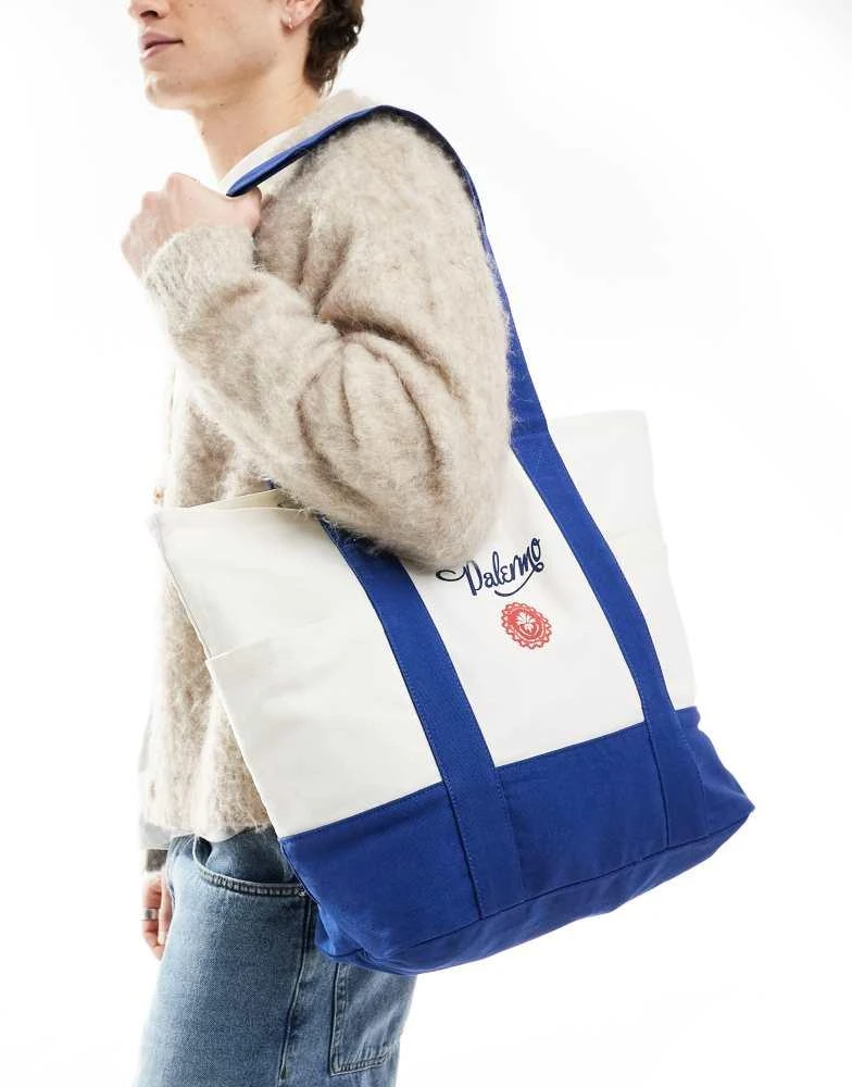 ASOS ASOS DESIGN canvas tote bag with graphic in white and blue 1
