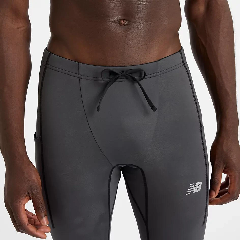 New Balance Athletics Reflective Warming Pocket Tight 8