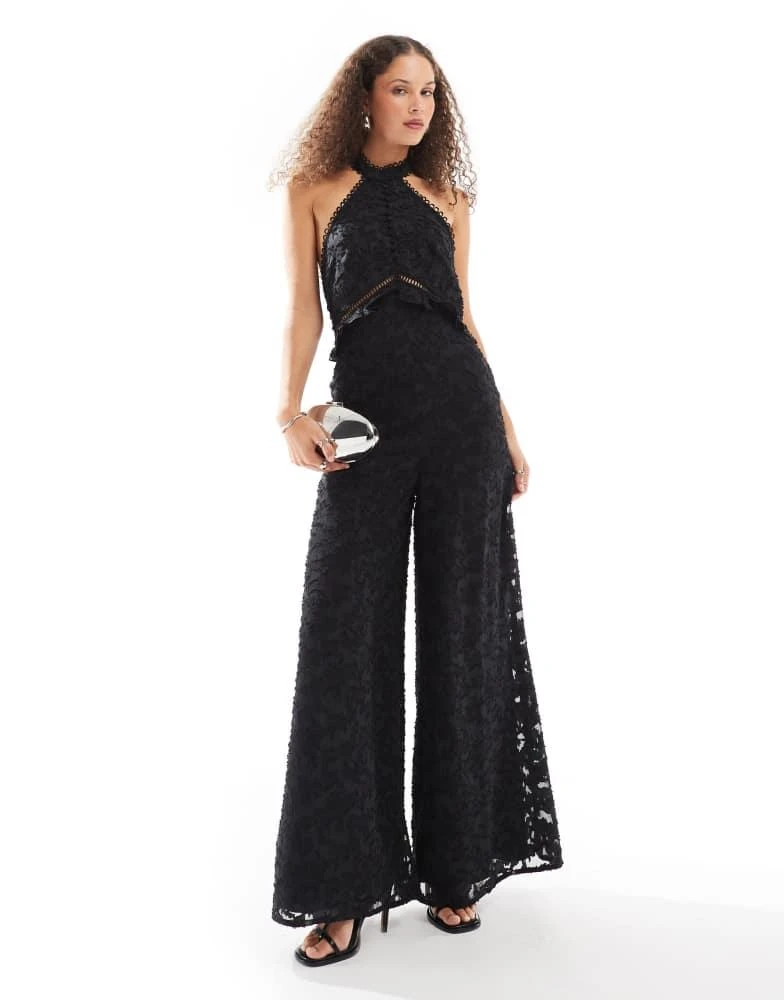 ASOS ASOS DESIGN jacquard halter wide leg jumpsuit in black 1