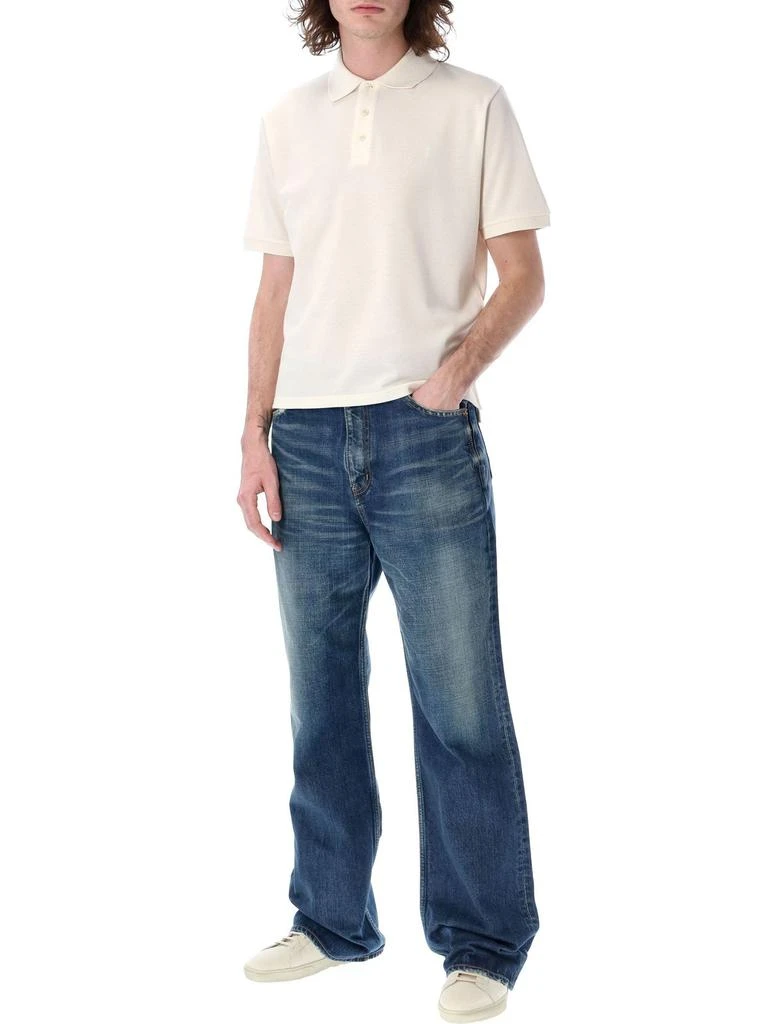 Yves Saint Laurent Saint Laurent Whiskering-Effect Distressed Bootcut Jeans 4