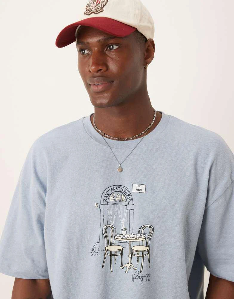 ASOS ASOS DESIGN boxy oversized linen blend t-shirt with cafe graphic in light blue 1