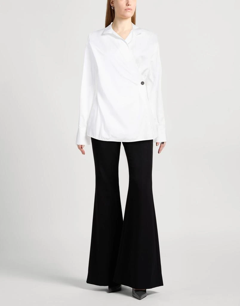 Salvatore Ferragamo Solid color shirts
blouses 2