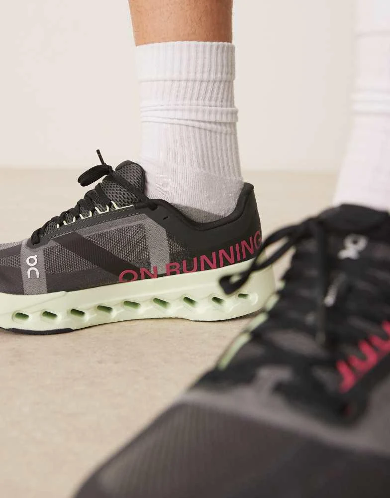 On ON Cloudsurfer Next running trainers in black and lime green 3