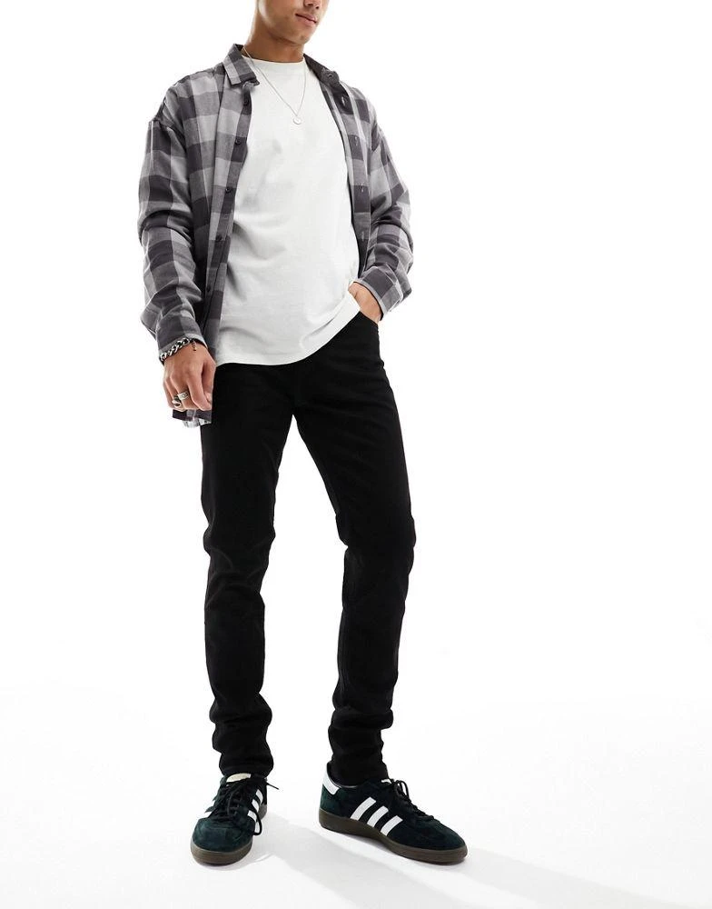 Weekday Weekday Friday low waist skinny jeans in black 5