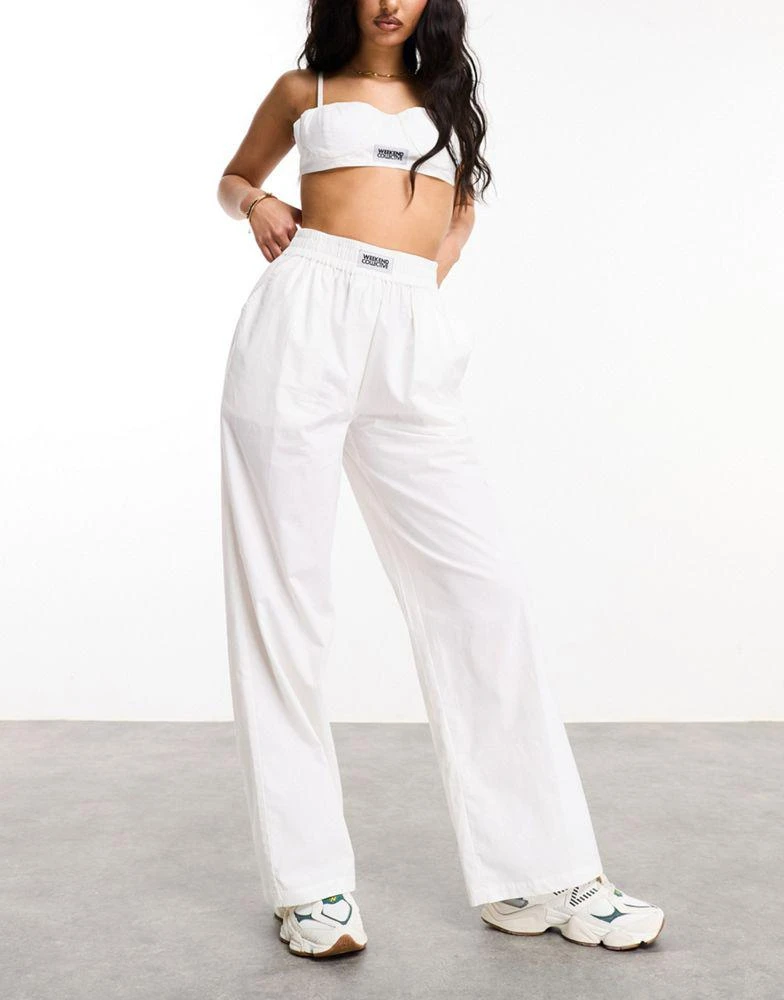 ASOS Weekend Collective Weekend Collective woven trousers with label in white 3