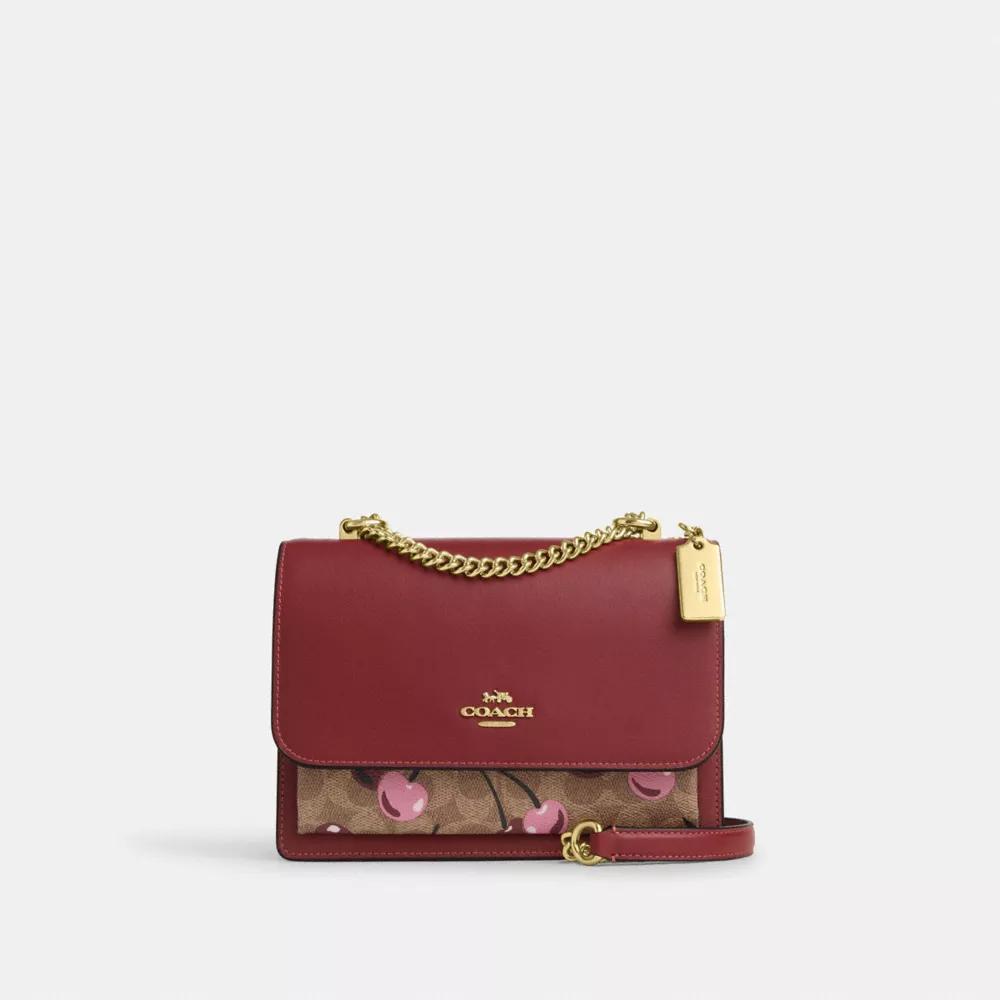 undefined Klare Crossbody Bag In Signature Canvas With Cherry Print