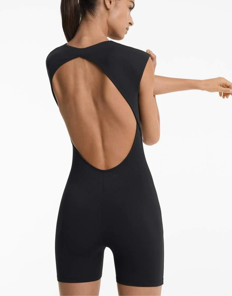OYSHO OYSHO Open-back technical comfortlux short jumpsuit in black -  Jumpsuits - BeyondStyle
