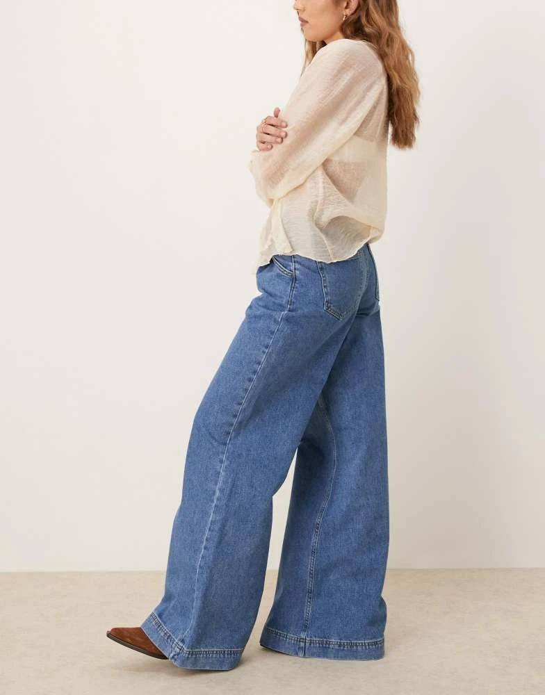 ASOS ASOS DESIGN pleated low rise jeans in mid blue 2