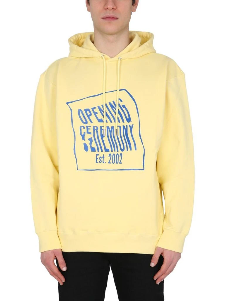 Opening Ceremony Opening Ceremony Warped Logo Printed Hoodie 1