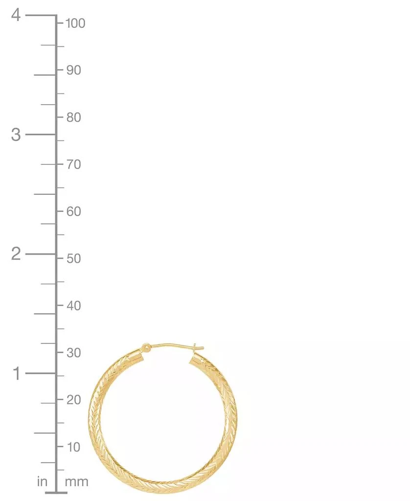 Macy's Polished Chevron Textured Tube Medium Hoop Earrings in 14K Yellow Gold, 1-3/8" 3