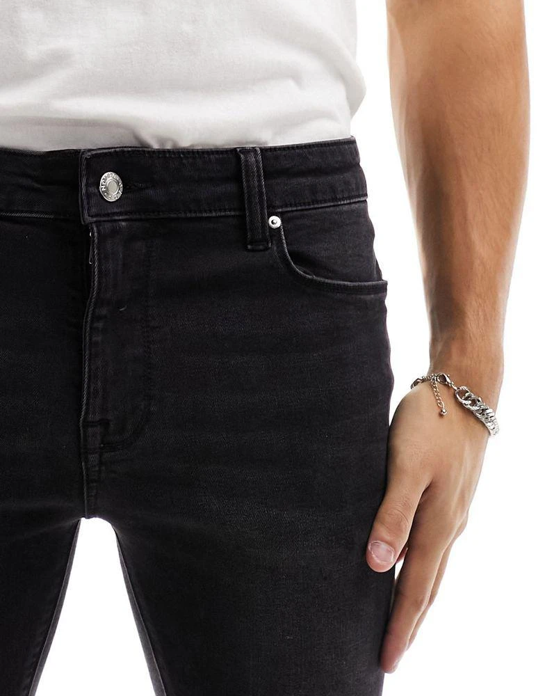 ASOS ASOS DESIGN spray on jeans with power stretch and released hem in grey 5