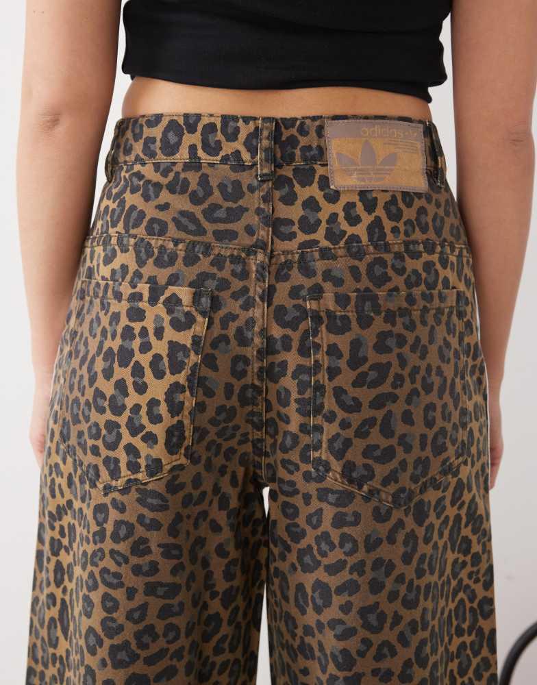 Shop adidas Originals wide leg denim jeans in leopard print