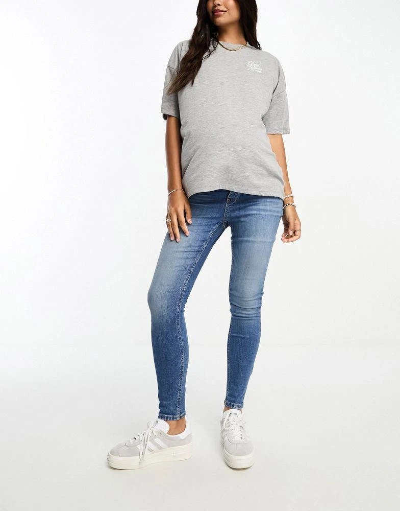 ASOS ASOS DESIGN Maternity ultimate skinny jeans with over bump in blue 4