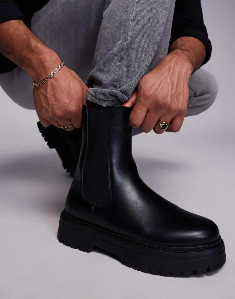 Shop ASOS DESIGN chelsea boots in black with chunky sole on  display picture 3
