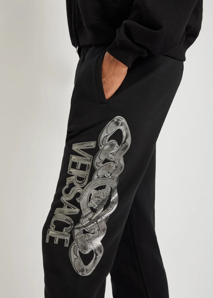 Versace Logo-printed cotton sweatpants 5
