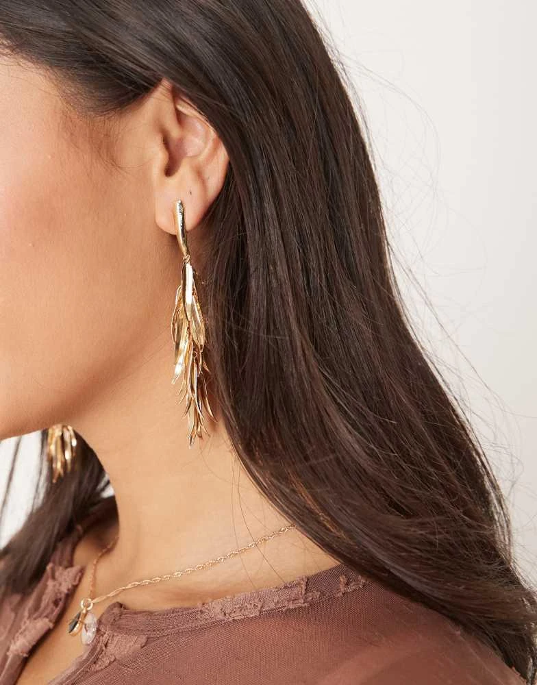 ASOS ASOS DESIGN drop earrings in mini leaf design tassel detail in gold tone 1