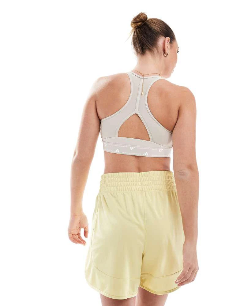 Adidas adidas Performance pacer essentials knit high-rise shorts in yellow 4