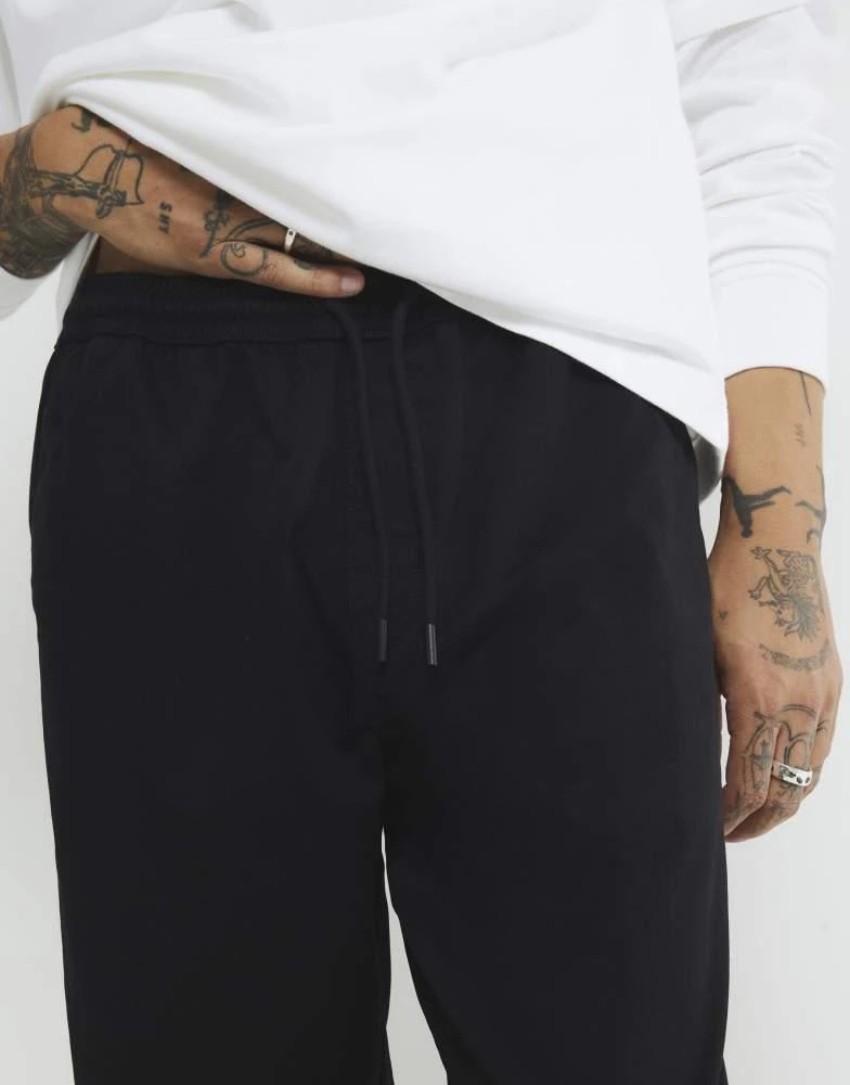 River Island River Island Regular fit pull on joggers in black 3