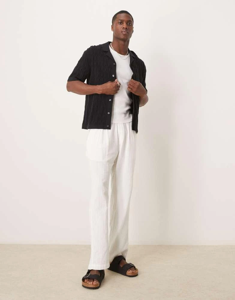 Abercrombie & Fitch Abercrombie & Fitch short sleeve knit button up polo in black 2