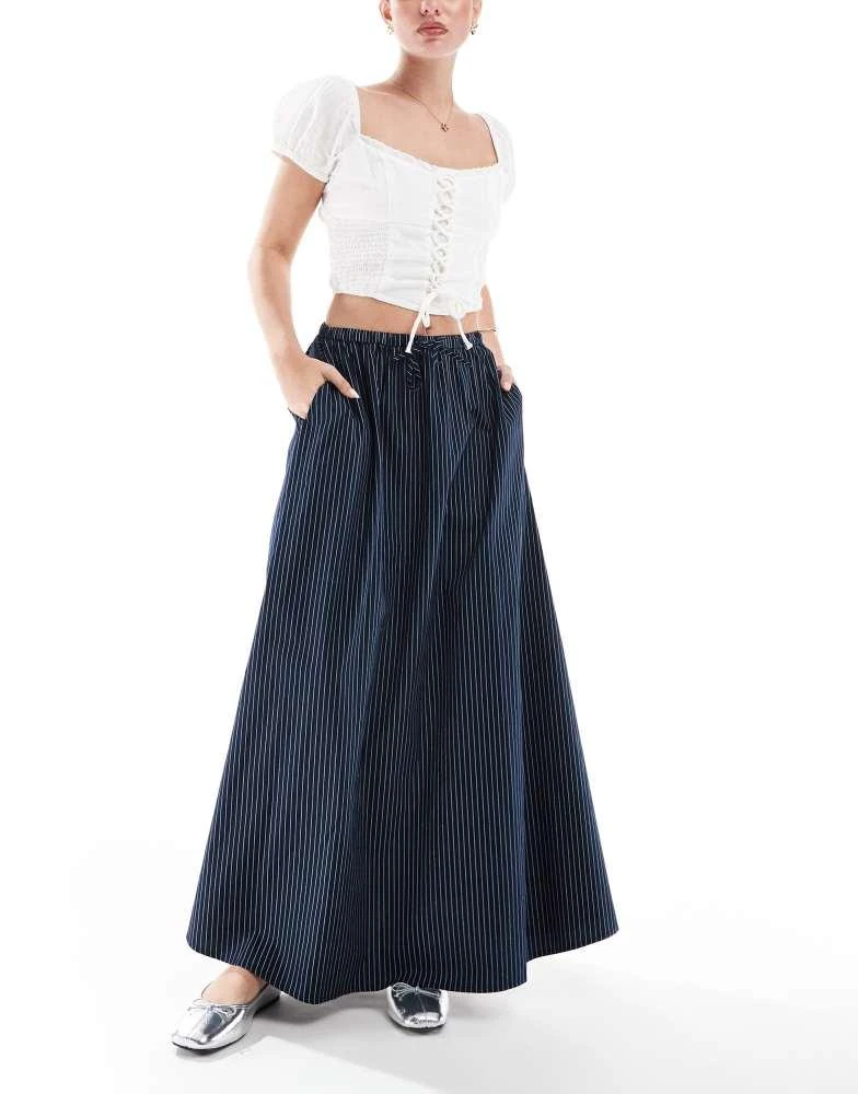 ASOS ASOS DESIGN a line tie waist midi skirt in navy stripe 2