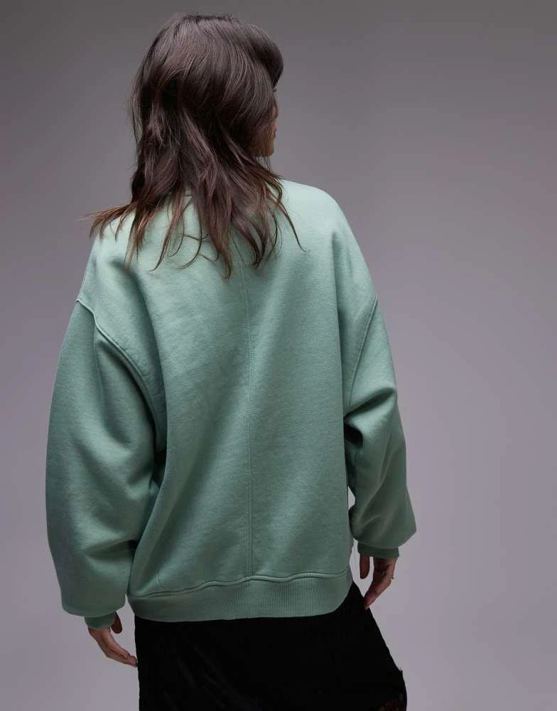 Topshop Topshop oversized washed sweatshirt with abstract graphic in green 4